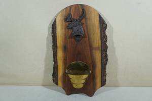 lot 171 image: Cast Iron Moose Head Bottle Opener on Walnut Slab