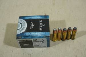 lot 189 image: 20 Federal Personal Defense .357 Magnum 125 Gr JHP Ammo - Plus 5 Loose Rounds