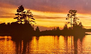 lot 214 image: Sunset at Land of Voyageurs Unframed Print