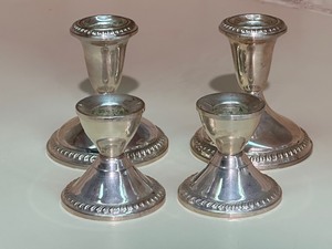 lot 126 image: Two Pairs of Vintage Weighted Sterling Candle Holders