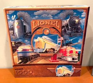 lot 294 image: Two Lionel Train Themed 1000 Piece Puzzles