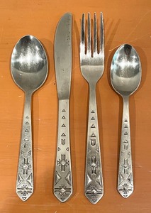 lot 348 image: Rogers Bros. Stainless Steel Southwestern Motif Flatware Grouping
