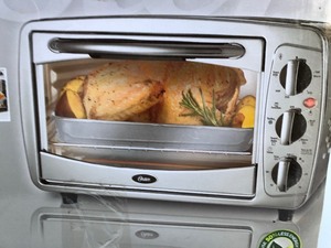 lot 167 image: Brand New OSTER Convection Countertop Oven