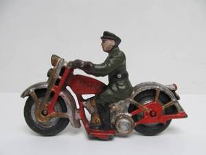 lot 33 image: Vintage Cast Iron PATROL Motorcycle Toy