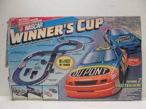 lot 57 image: Working NASCAR Winners Cup Slot Car Racing Set
