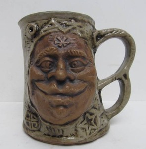 lot 85 image: Signed Vintage Stoneware JIM RUMPH Face MugTankard