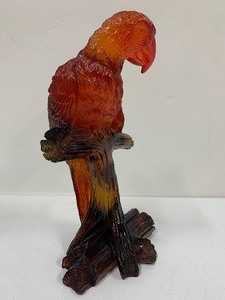 lot 190 image: Vintage Amber Acrylic Parrot Sculpture