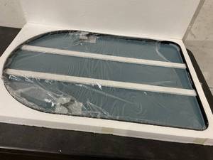 lot 105 image: Arched 24 x 36 inch Black Metal Framed Mirror