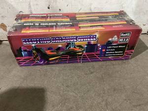 lot 42 image: Purple Hoverboard, Max weight 165lb Max Speed 9mph