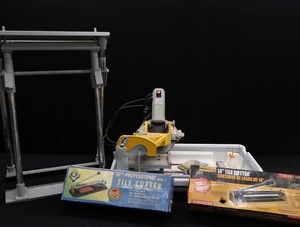 lot 63 image: WORKFORCE THD850 WET TILE SAW  STAND  2 XTRA CUTTERS