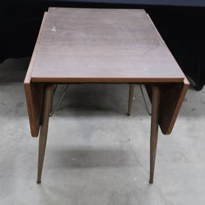 lot 101 image: VINTAGE FORMICA DROP LEAF TABLE