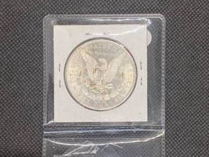 1880-S Morgan Silver Dollar marked MS65 when purchased