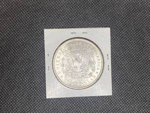 1885 Morgan Silver Dollar marked MS65 when purchased  Beautiful Coin