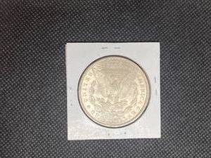 1889 Morgan Silver Dollar marked MS63 when purchased