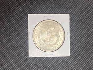 1921 Morgan Silver Dollar marked MS63 when purchased