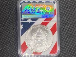 1986 American Silver Eagle NGC MS69 First Year of Issue NGC  Price Guide for an MS69 is $125