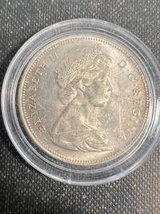 1965 CANADIAN SILVER DOLLAR IN AIRTITE