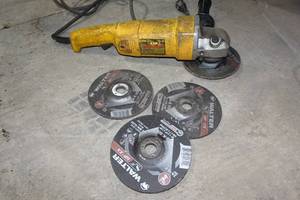 lot 250 image: DeWalt 7 Angle Grinder with Extra Blades