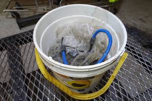 lot 290 image: Bucket of Screws and Bungee Cord