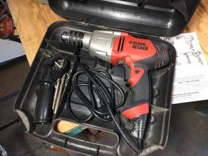lot 92 image: Black & Decker 12 Corded Hammer Drill