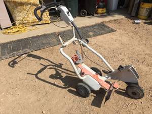 lot 106 image: Stihl Cement Saw HolderCarriage