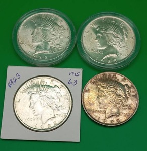 Four Silver Peace Dollars