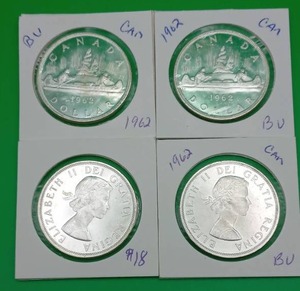 Four 1962 Canadian Silver Dollars