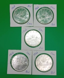 Five 1962 Canadian Silver Dollars