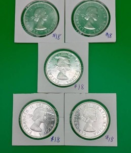 Five 1962 Canadian Silver Dollars