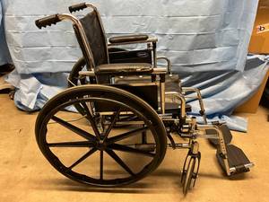 lot 32 image: Invacare Wheelchair - Good Condition - Armrests have Wear