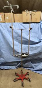 lot 38 image: MSRP $1000 Mid Central Medical Double IV Pole with Steering Wheel and Tray - Good Condition