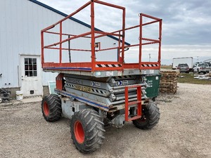 lot 3 image: SkyJack Rough Terrain Scissor Lift