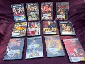 lot 15 image: 12 Adventure DVDs All Professionally Cleaned