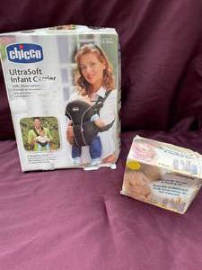 lot 34 image: NEW Ultra Soft Infant Carrier. Fits 7.5-25 Lbs. New Breast Milk Storage & Feeding Set. Box Is Damaged