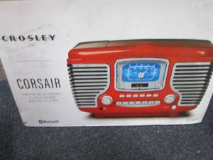 lot 40 image: Crosley Corsair Bluetooth CD Player...