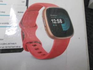 lot 104 image: Fitbit Versa 4 open box, does not b...