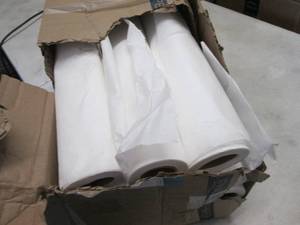 lot 126 image: Damaged Case Exam Table Paper Rolls...