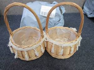 lot 294 image: 2- 2pks Small Woven Baskets...