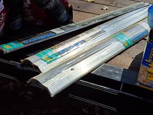 lot 424 image: Lot of (3) Door Weatherstripping - Aluminum Threshold with Vinyl Seal 1-18Hx36L & 34Hx36L