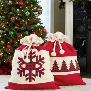 lot 68 image: Jumbo Holiday Gift Bags - Red & BlackPlad, Set of 4