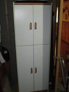lot 166 image: Tall 4-door pantry style cabinet (measures approximately 2514.572