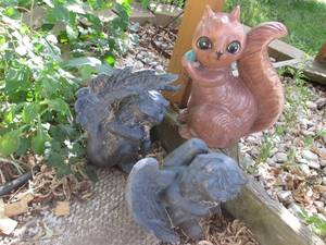 lot 197 image: Cement squirrel and 2 angels