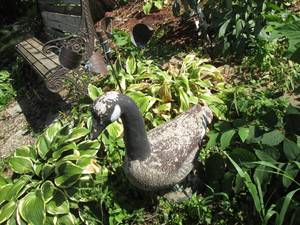 lot 200 image: Cement goose and garden spinner