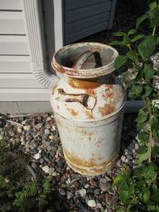 lot 205 image: Milk can with lid
