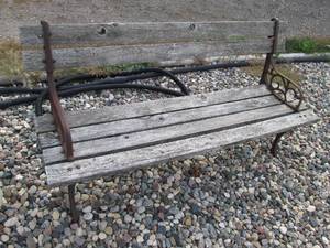 lot 207 image: Wood and Cast Iron garden bench