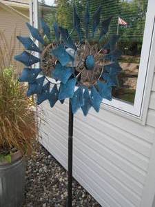 lot 213 image: Metal wind spinner garden art