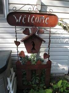 lot 217 image: Large birdhouse and fence trellis style yard decor