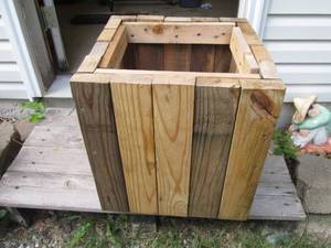 lot 219 image: Heavy duty wood planter or garbage receptacle