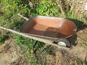 lot 228 image: Standard size metal and wood wheelbarrow