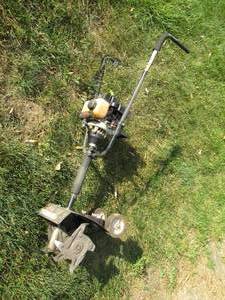 lot 231 image: Ryobi 31cc gas powered 9 garden tiller